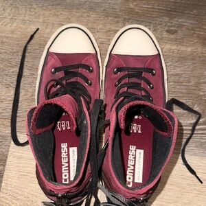 Suede Converse Oxblood and Black High-Top Sneakers.
